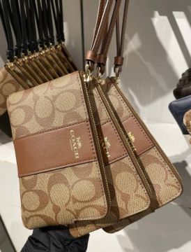 COACH F58035 CORNER ZIP WRISTLET IN SIGNATURE CANVAS